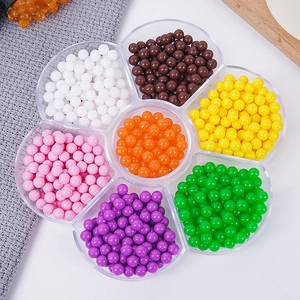 Colorful toy taro balls and jelly beans in a floral storage box for dessert DIY decor