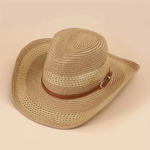 Close-up of hand-woven straw cowboy hat with premium brown leather belt and metal buckle