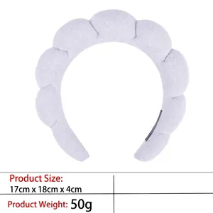 Detail view of purple puffy headband with 17x18x4cm dimensions and lightweight 50g fabric