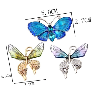 Detailed view of colorful butterfly brooches with crystal inlay and specific dimensions