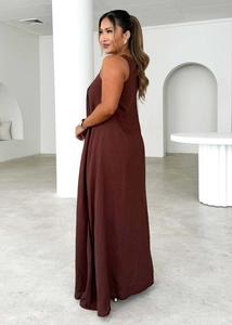Detail view of deep chocolate brown sleeveless loose maxi dress on model