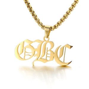 Golden titanium steel GBC letter pendant necklace with box chain on white background
