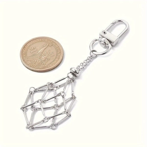 Silver metal mesh cage keychain with spring buckle for crystals shown with size coin