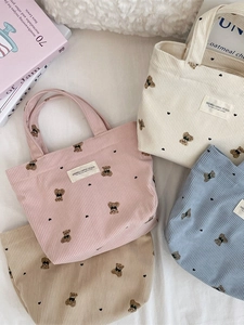Mini corduroy tote bags with cute bear embroidery in pink, beige, blue, and khaki