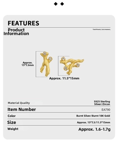 Detail of S925 sterling silver asymmetrical branch earrings with 18K gold plating and zircons