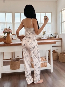 Detail view of cute bear print loungewear set featuring wavy hem and adjustable straps