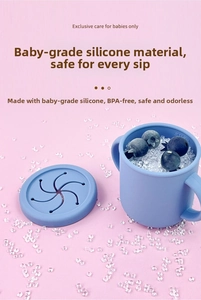 Macro view of food-grade silicone baby cup featuring BPA-free material and spill-proof screw lid