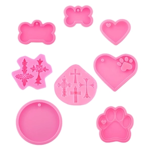 8-teiliges Set aus rosa Silikonformen für DIY-Schlüsselanhänger mit Herzen und Tatzen