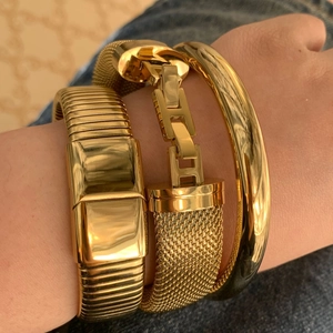 Three-piece gold plated stainless steel bracelet set featuring an H-link and mesh design