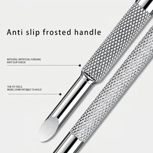 Double-ended stainless steel nail pusher with knurled non-slip handle for manicure care