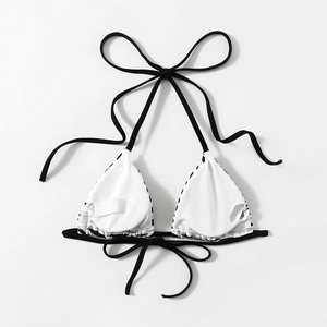Halter neck triangle bikini top in black and white with adjustable ties and padding