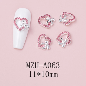 Detailed view of pink rhinestone heart nail charms with hollow bow design, size 11x10mm