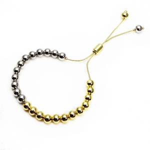 Adjustable two-tone gold and silver beaded bracelet with sliding knot closure for women