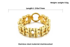 Detail view of gold stainless steel bike chain bracelet with cross pattern and spring clasp