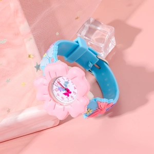 Close-up of pink flower case and blue 3D butterfly silicone strap on kids quartz watch