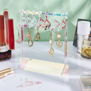 Iridescent acrylic jewelry display stand with mini hangers for earrings and necklaces