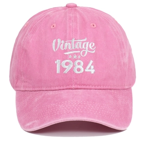 Detail of Vintage 1984 white embroidery on pink washed cotton baseball cap with star motifs