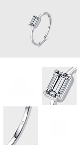 Detailed close-up of S925 sterling silver stamp and emerald-cut zircon on the ring