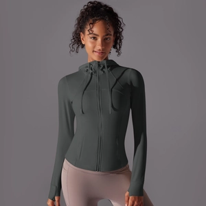 Detail of slim fit charcoal sports jacket featuring thumbholes and high-stretch yoga fabric