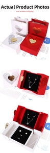 Detailed view of the red jewelry gift set box with golden Everlasting Love heart clasp