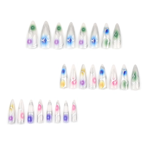 Long almond press-on nails with colorful gradient smudge and silver flame line art