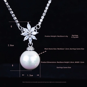 Detailed view of white pearl flower necklace pendant with zirconia crystals and size labels