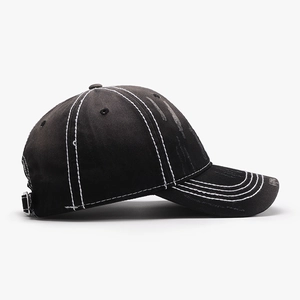Black cotton baseball cap with white contrast stitching and distressed vintage finish