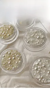 Flatback creamy white faux pearls in transparent jars for nail art decoration