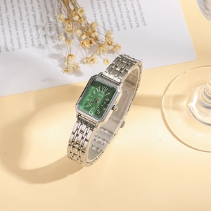 Elegant emerald square dial quartz watch with silver stainless steel strap for women