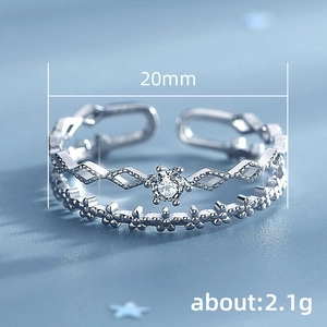 Double-layered silver lace ring with hollow diamond shape and sparkling zircon stone