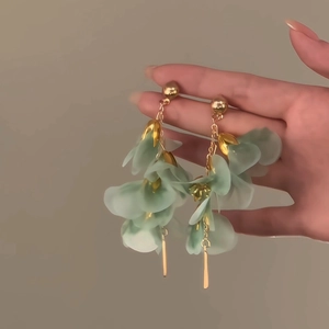 Elegant long fringe earrings with light green mesh flower petals and golden leaf charms
