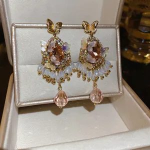Vintage crystal butterfly tassel earrings with amber teardrop stone and gold finish