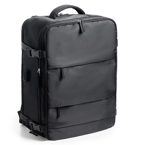 Black travel backpack with multiple compartments, nylon fabric and side buckle detail