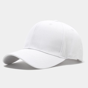 Detail of the twill fabric and curved brim on a minimalist white baseball cap