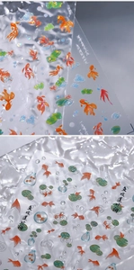 Detailed macro of koi fish and lotus leaf nail art stickers with laser finish