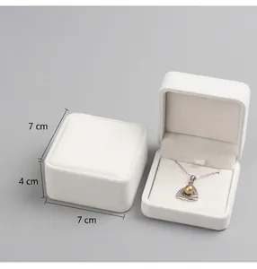 White flocked pendant jewelry box with size 7x7x4cm and soft velvet interior padding
