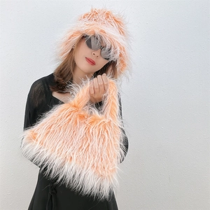 Matching orange gradient faux sheepskin bucket hat and plush handbag set for women