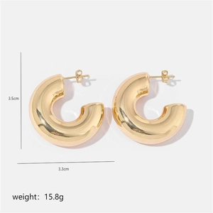 Detailed view of gold irregular C-shape hoop earrings showing 3.5cm size and 3.3cm width