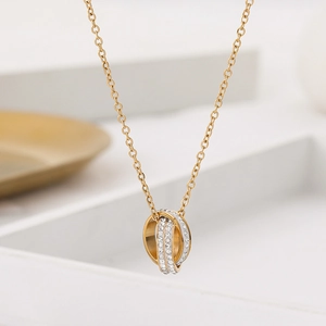 Sparkling rose gold titanium steel necklace with interlocked double diamond rings pendant