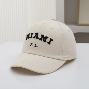 Detail of beige cotton baseball cap featuring black 3D Miami letter embroidery
