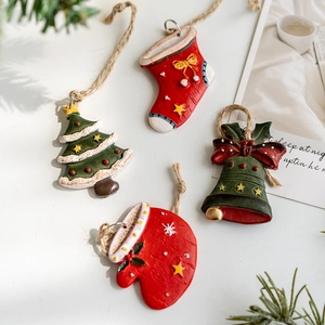 Vintage resin Christmas ornaments set including tree, bell, glove and stocking with ropes