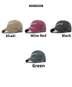 Detail view of washed cotton baseball caps in khaki, burgundy, black and dark green colors