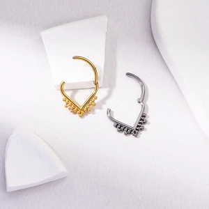 G23 titanium V-shape hinged nose ring with tiny bead drop details in gold and silver