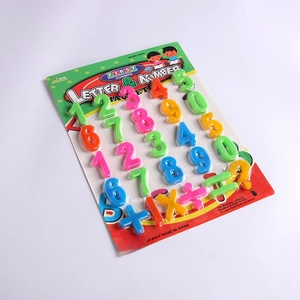 Set of colorful magnetic numbers and math symbols in educational blister packaging