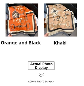 Detail showing orange-black and khaki scarves with classic horsebit and chain patterns
