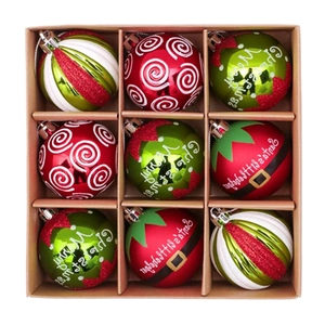 Detail of 9-pack Christmas ornaments box with red green and white patterned balls