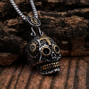Gothic stainless steel sugar skull cross pendant necklace on rustic wood background