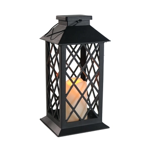 Detail of vintage black lantern with diamond lattice and warm LED candle inside