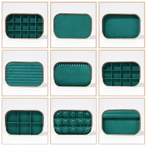 Detailed grid showing emerald green velvet jewelry trays with gold metallic trim