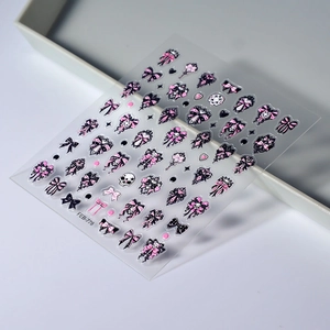 5D embossed nail stickers featuring pink bows and skull designs on model FEB-778 sheet